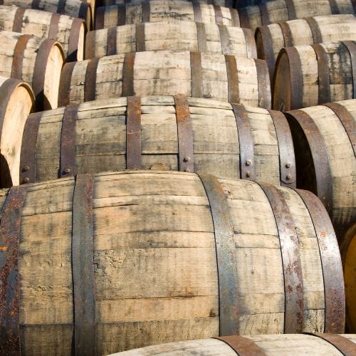 Wooden barrels stacked in a traditional brewery in Dublin, Ireland