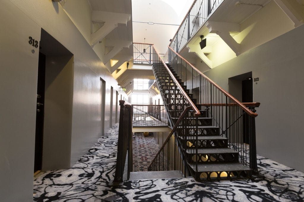 Staircase inside Hotel Katajanokka, a former prison turned luxury hotel in Helsinki