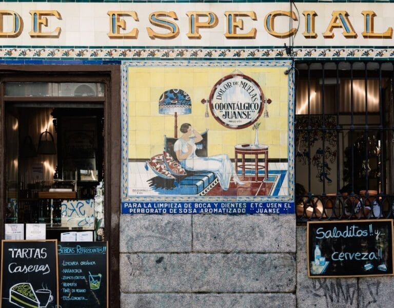 LGBTQ community celebrating in the vibrant streets of Madrid's Chueca neighborhood, symbolizing the city's inclusive spirit.