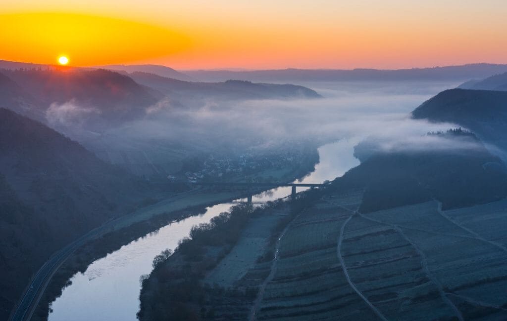 Evening view of the Moselle River during an Arosa cruise.