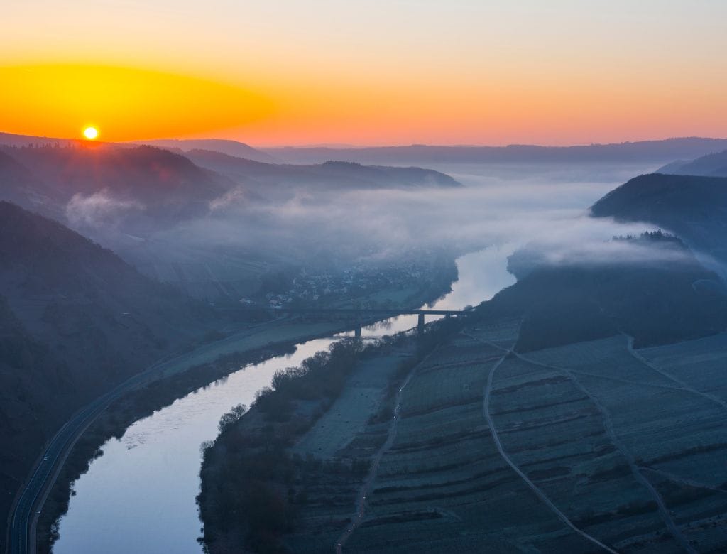 Evening view of the Moselle River during an Arosa cruise.