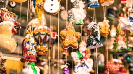 Assortment of traditional Christmas pastries and cookies displayed at a European Christmas market.
