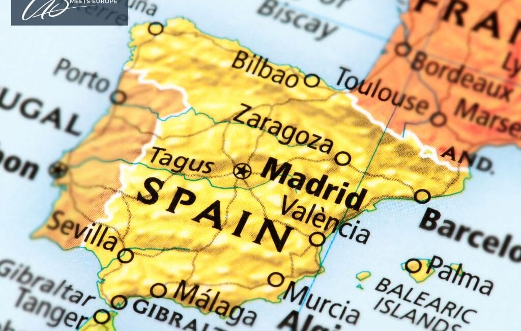 Antique map of Spain with historical boundaries and key regions.